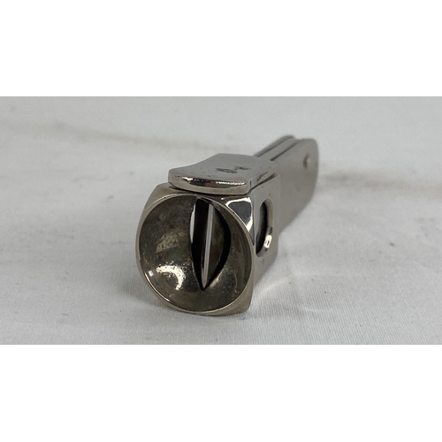 184 - A silver plated cigar cutter.