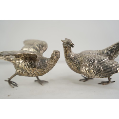 186 - A stunning pair of Sterling silver pheasants/ birds, weight 560g.