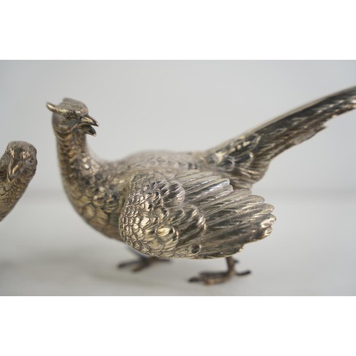 186 - A stunning pair of Sterling silver pheasants/ birds, weight 560g.