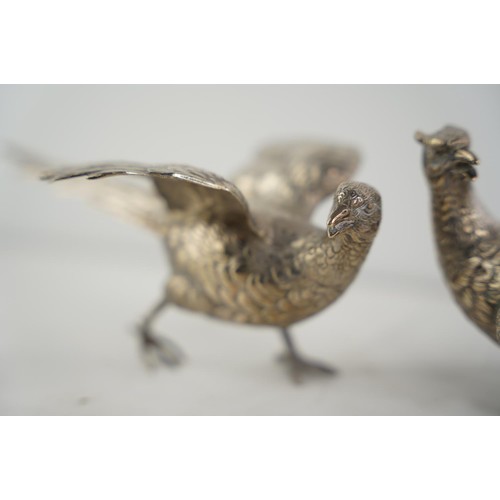 186 - A stunning pair of Sterling silver pheasants/ birds, weight 560g.