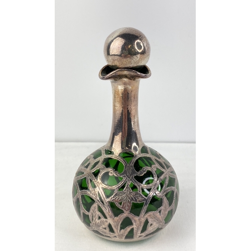 201 - A Sterling silver and green glass perfume bottle (stopper a/f).