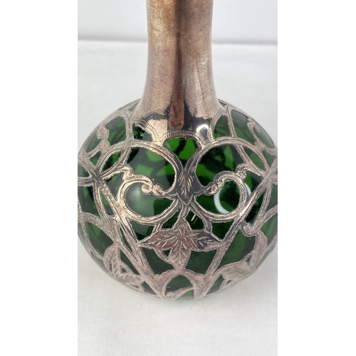 201 - A Sterling silver and green glass perfume bottle (stopper a/f).