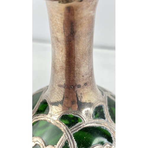 201 - A Sterling silver and green glass perfume bottle (stopper a/f).