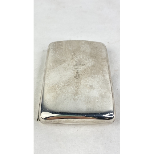 202 - A stunning antique Sterling silver cigarette case, engraved with 'XMAS 1902' with the Royal Cypher.