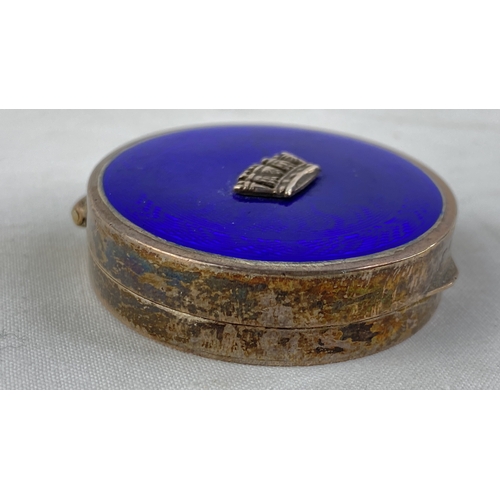 204 - A stunning Sterling silver and blue enamel pill box with crown detail, total weight 32g.