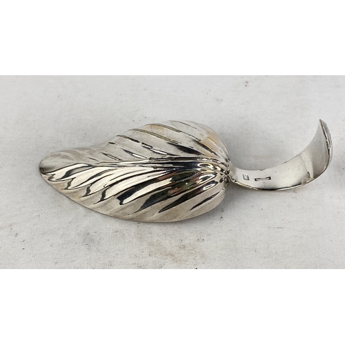 214 - A Sterling silver caddy spoon in the shape of a leaf, weight 25g.