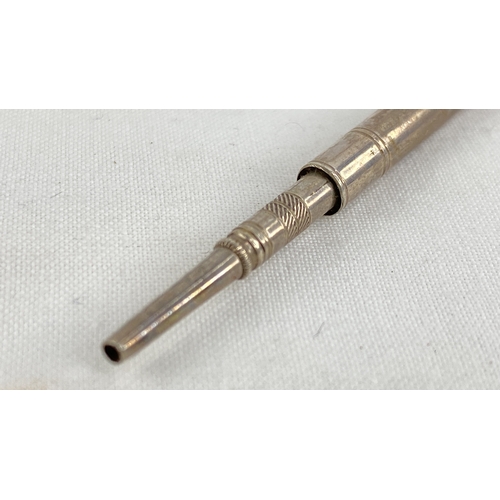 216 - A Sterling silver propelling pen and pencil, total weight 33g.