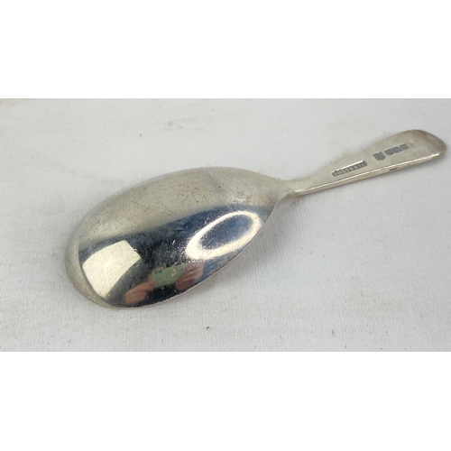 220 - A Sterling silver caddy spoon, weight 17g.