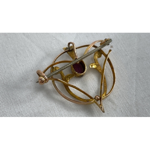 225 - An antique gold brooch/pendant with pearl and amethyst stone.