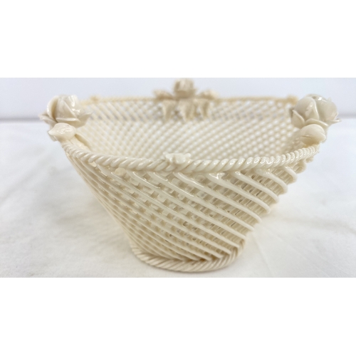 227 - A Belleek pottery four strand basket with rose detail (a/f).