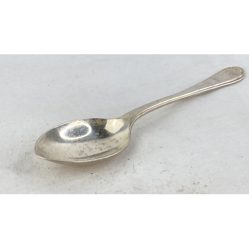 236 - A Sterling silver 'golf' design teaspoon, weight 14g.