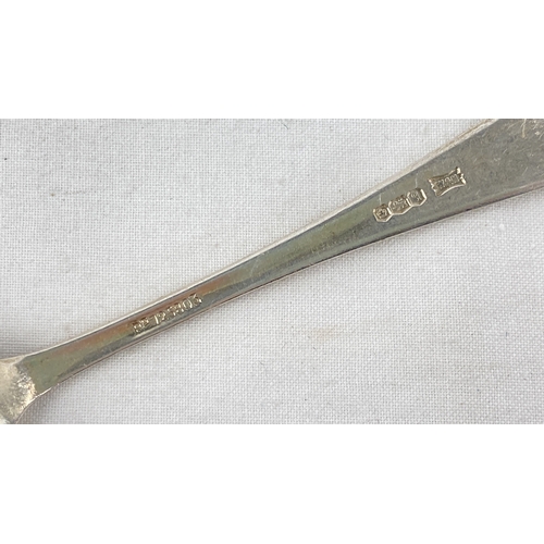 236 - A Sterling silver 'golf' design teaspoon, weight 14g.