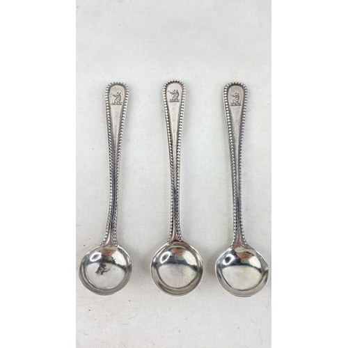 243 - A set of three Sterling silver salt spoons, weight 22g.