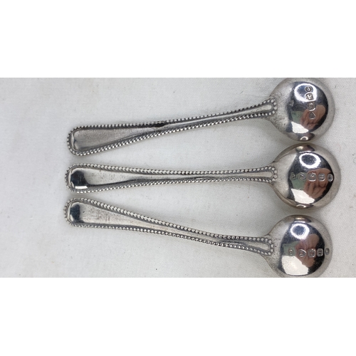 243 - A set of three Sterling silver salt spoons, weight 22g.