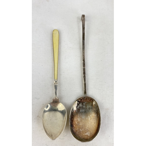 244 - A stunning Sterling silver and enamel handled spoon and another.