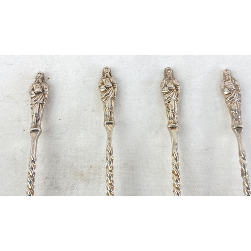 245 - A set of four Sterling silver Apostle teaspoons, weight 51g.