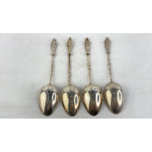 245 - A set of four Sterling silver Apostle teaspoons, weight 51g.