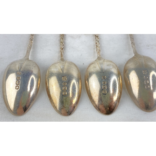 245 - A set of four Sterling silver Apostle teaspoons, weight 51g.