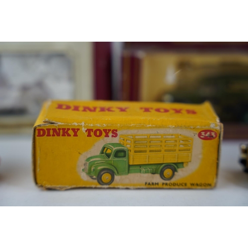 249 - A boxed Dinky Toys 'Farm Produce Wagon' and four others.