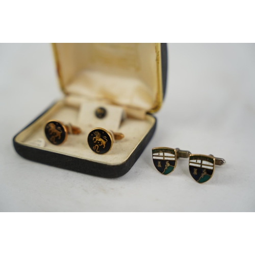 250 - A vintage 'Leo' cufflink and tie pin set and more.