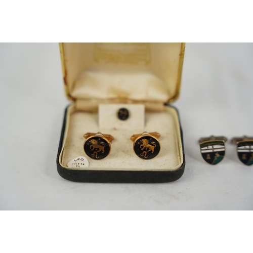 250 - A vintage 'Leo' cufflink and tie pin set and more.