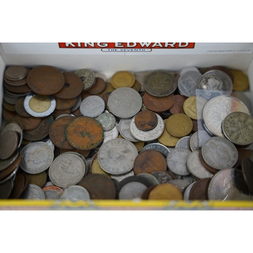 251 - Two commemorative coins sets and a lot of assorted coinage.