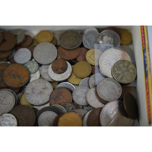 251 - Two commemorative coins sets and a lot of assorted coinage.