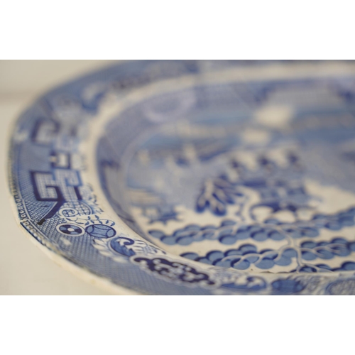 252 - An antique blue and white Indian Tree patterned platter.