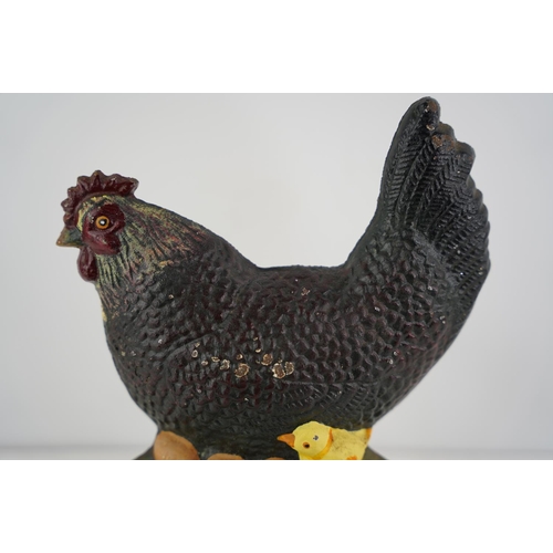 274 - A cast iron doorstop in the style of a hen.