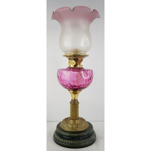 276 - A stunning antique ruby glass font oil lamp and etched glass shade.