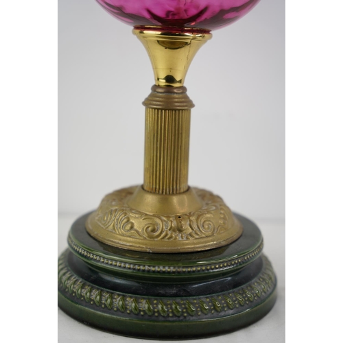 276 - A stunning antique ruby glass font oil lamp and etched glass shade.