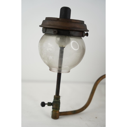 279 - An early Tilley 'Swan Neck' lamp, with small chip to glass shande.