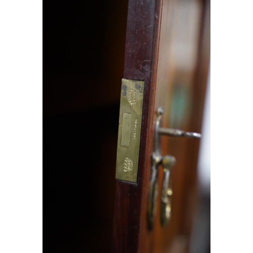 281 - A stunning inlaid antique style linen cabinet with drawers to base.