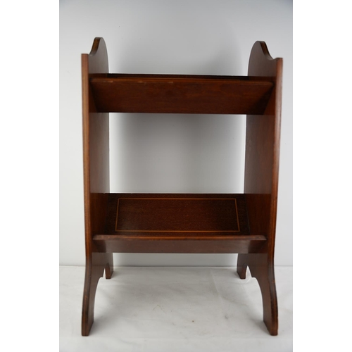 285 - An antique mahogany and inlay shell design book stand.