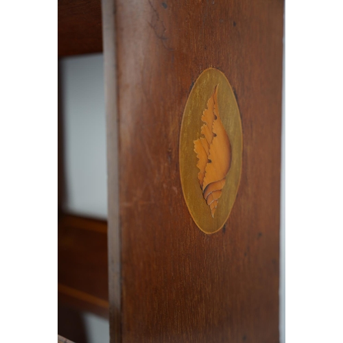 285 - An antique mahogany and inlay shell design book stand.