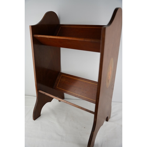 285 - An antique mahogany and inlay shell design book stand.