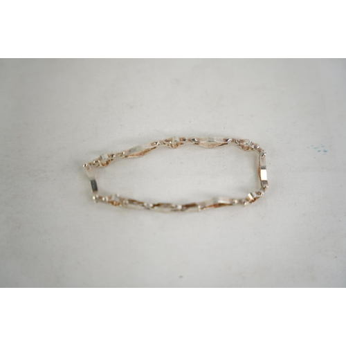 316 - A Sterling silver bracelet.