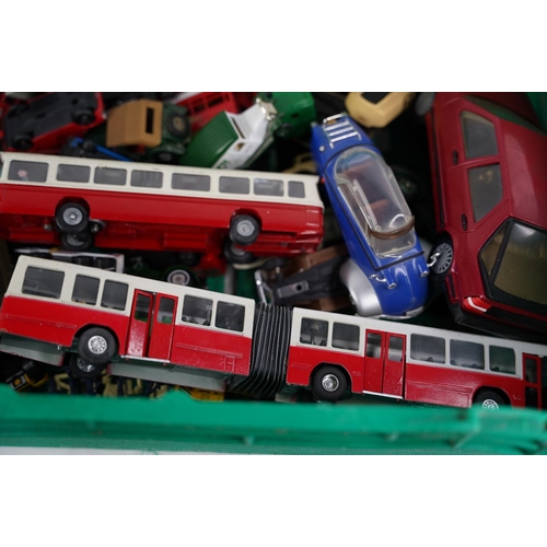 323 - A large lot of toy cars, buses etc to include Budgie Toy, Matchbox, Corgi and lots more.