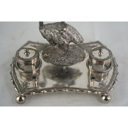 326 - A stunning antique silver plated desk set with ostrich design & 2 inkwells.