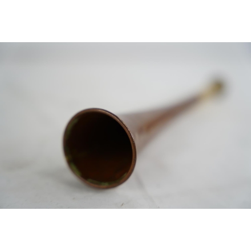 327 - A vintage copper & brass hunting horn, by Boosey & Co Ltd makers, London.