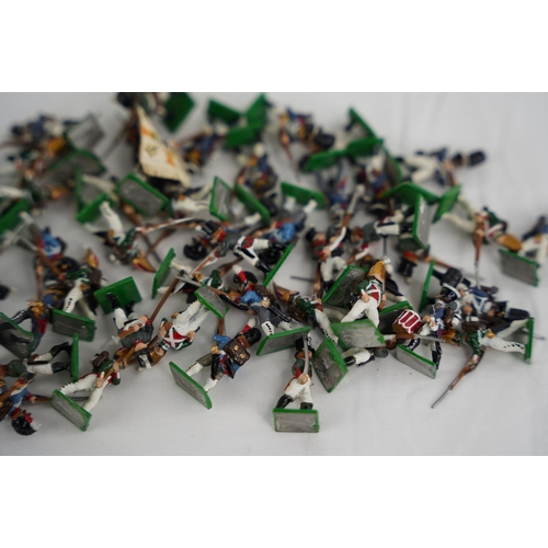 333 - A collection of approximately 50 hand painted miniature metal figures.