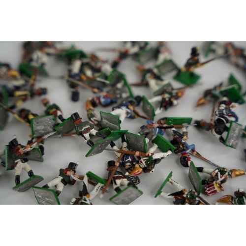 334 - A collection of approximately 50 hand painted miniature metal figures.