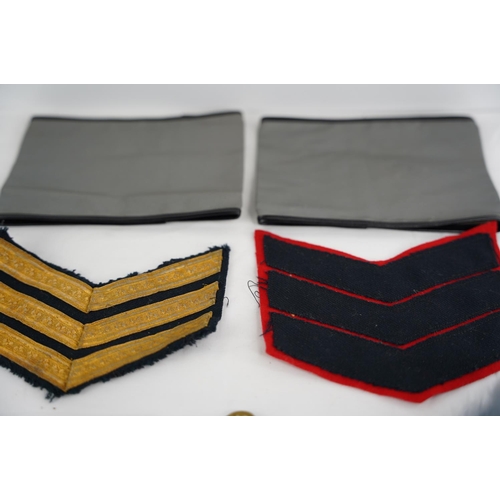 341 - An assortment of various items to include Military badges, patches & more.