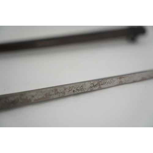 348 - An antique French 1881 Bayonet in original metal scabbard.