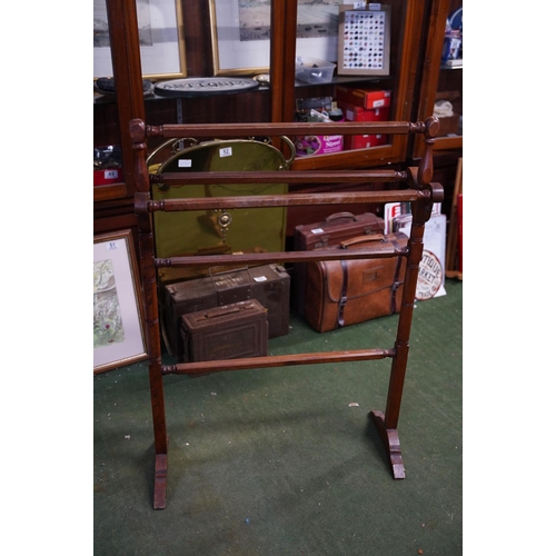 361 - An antique wooden towel rail.