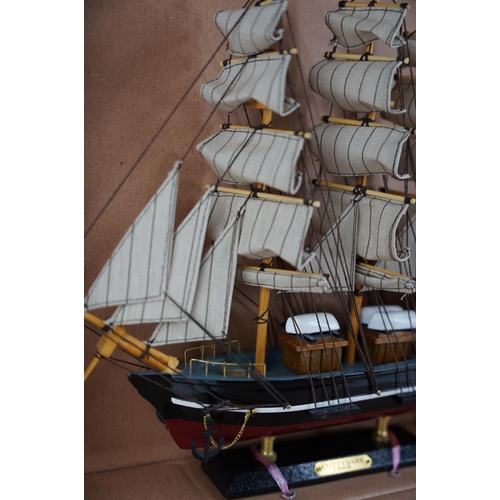 370 - A wooden model ship.