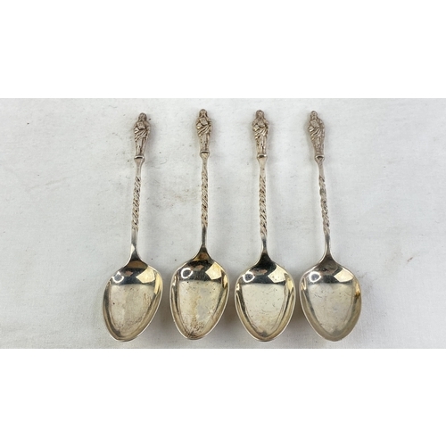 245 - A set of four Sterling silver Apostle teaspoons, weight 51g.