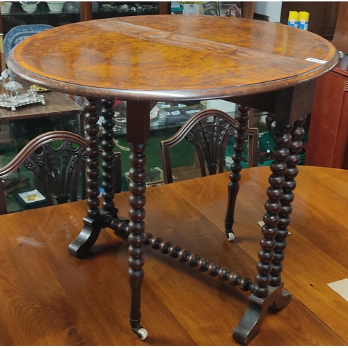 383 - A stunning antique/ Victorian burr walnut Sutherland table.