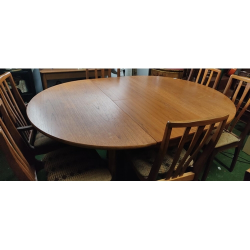 398 - A stunning Mid Century/ vintage teak dining extending table & set of 6 chairs (including 2 carvers).