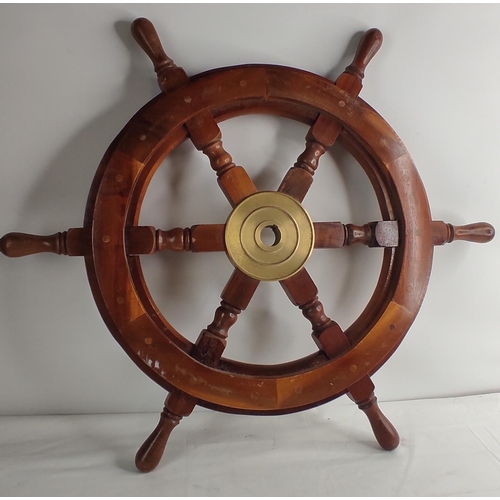 400 - A vintage wood & brass ships wheel.